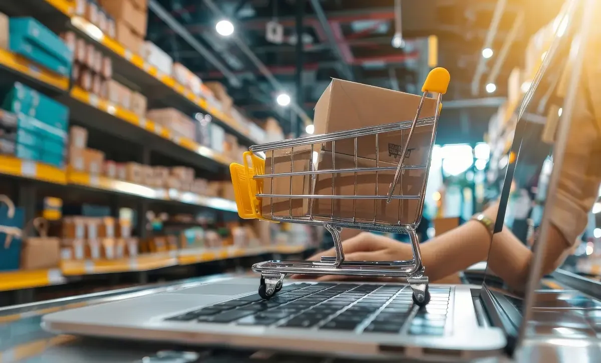 Online shopping basket on a laptop in a retail store aisle